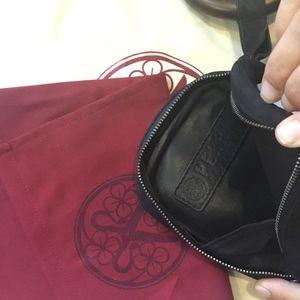 Perrin Paris clutch with wrist bracelet